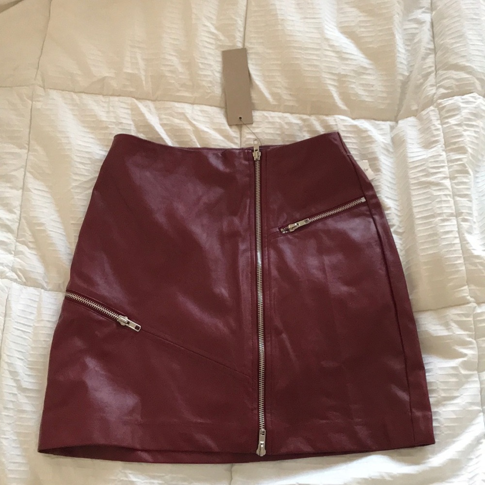 Red leather mini skirt.
